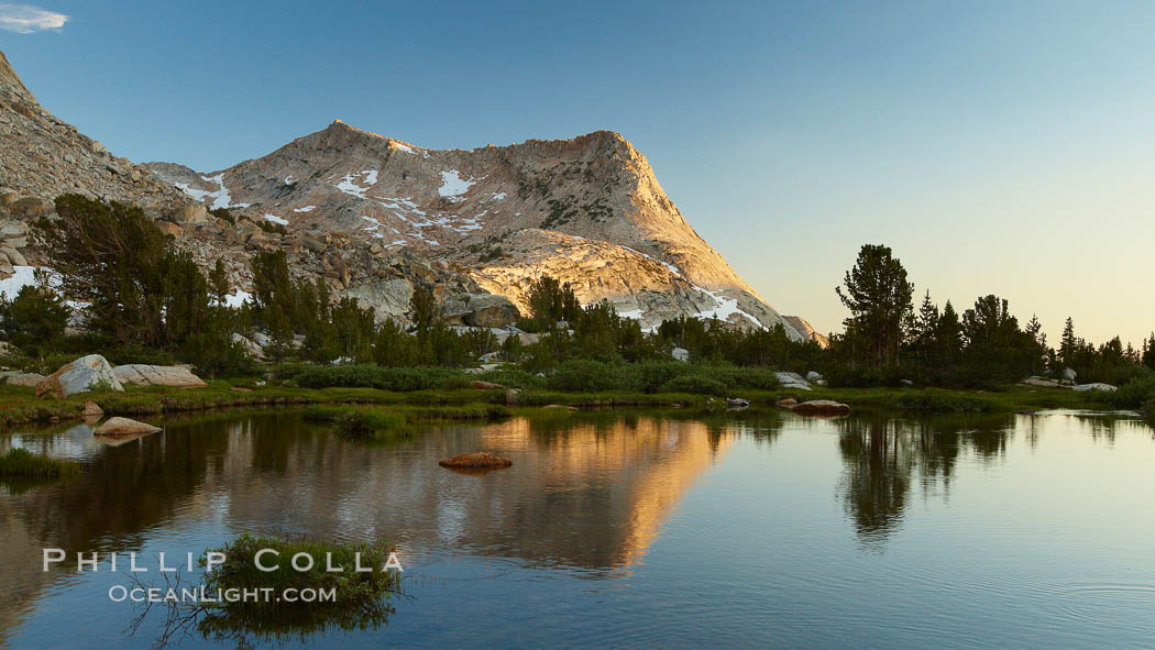 Vogelsang Peak (11516') at sunset, reflected in a small creek near Vogelsang High Sierra Camp in Yosemite's high country, Yosemite National Park, California