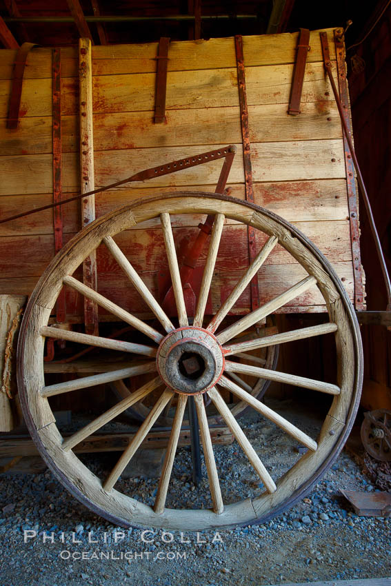 Wagon wheel, in County Barn. Bodie State Historical Park, California, USA, natural history stock photograph, photo id 23149