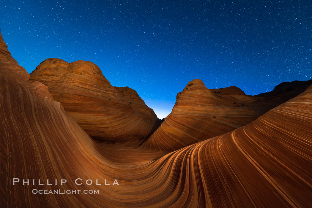 The Wave at Night, under a clear night sky full of stars. The Wave, an area of fantastic eroded sandstone featuring beautiful swirls, wild colors, countless striations, and bizarre shapes set amidst the dramatic surrounding North Coyote Buttes of Arizona and Utah. The sandstone formations of the North Coyote Buttes, including the Wave, date from the Jurassic period. Managed by the Bureau of Land Management, the Wave is located in the Paria Canyon-Vermilion Cliffs Wilderness and is accessible on foot by permit only