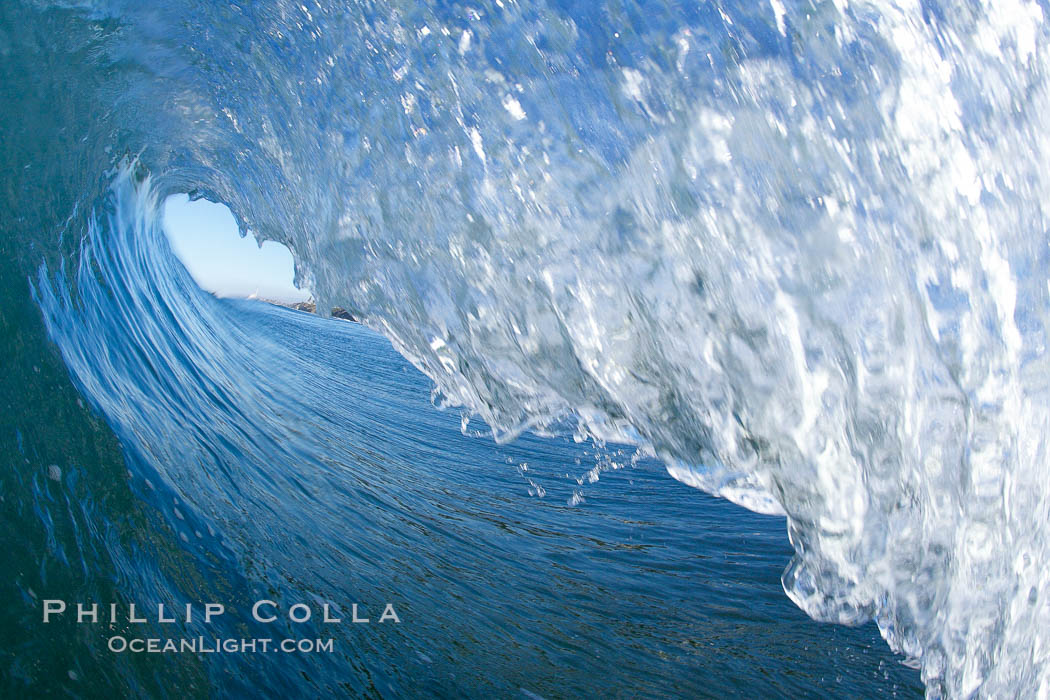 Wave breaking in early morning sunlight, Ponto, Carlsbad, California