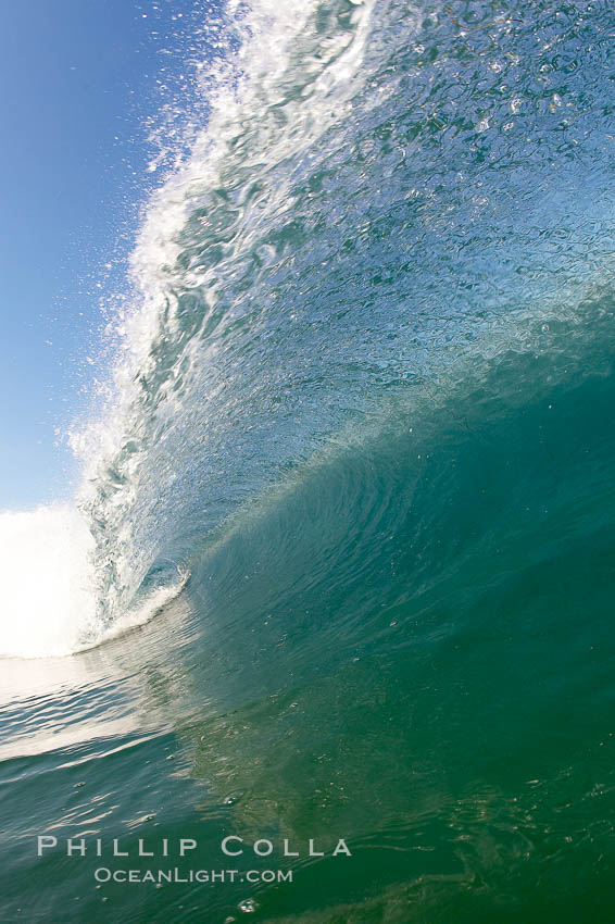 Cresting wave, morning light, glassy water, surf, Cardiff by the Sea, California