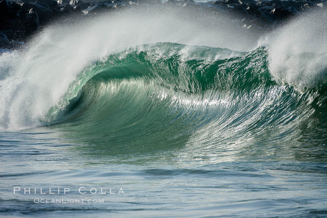 A large, powerful wave breaks with offshore winds at the Wedge in Newport Beach, The Wedge