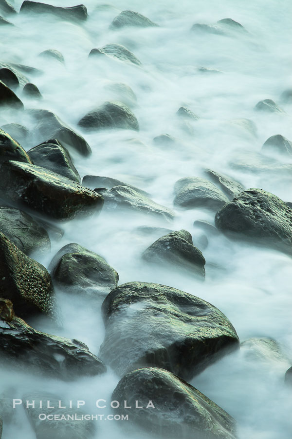 Waves and beach boulders, abstract study of water movement., natural history stock photograph, photo id 26450
