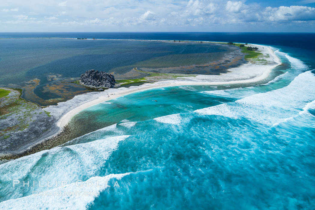 Waves break on the coral reef and wash ashore at Clipperton Island, aerial photo. Clipperton Island, a minor territory of France also known as Ile de la Passion, is a spectacular coral atoll in the eastern Pacific. By permit HC / 1485 / CAB (France)., natural history stock photograph, photo id 32836