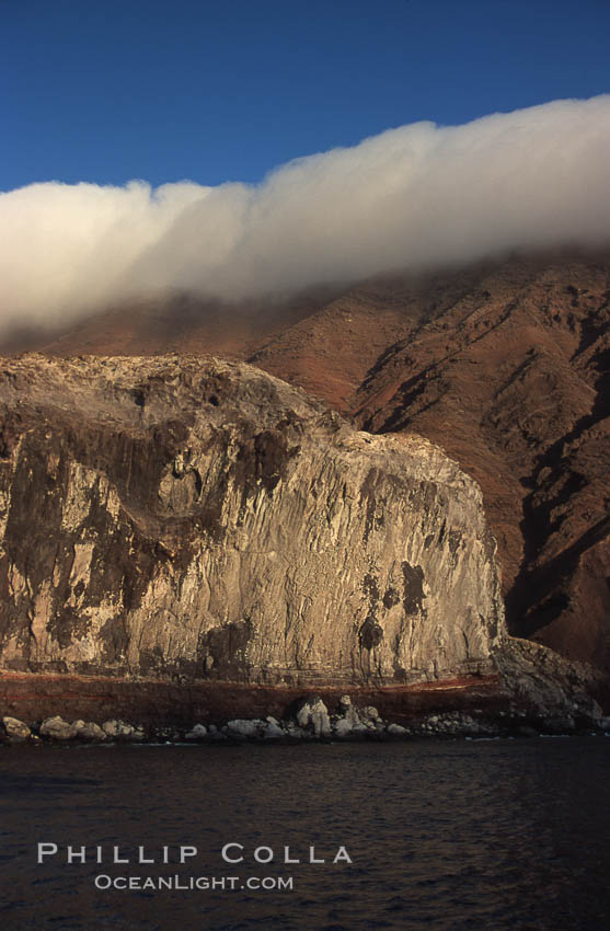 Clouds held back by island crest. Guadalupe Island (Isla Guadalupe), Baja California, Mexico, natural history stock photograph, photo id 03849