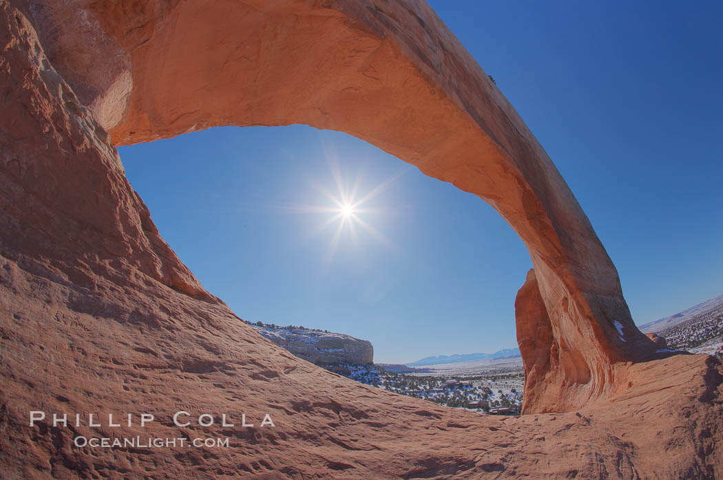 Wilson Arch rises high above route 191 in eastern Utah, with a span of 91 feet and a height of 46 feet