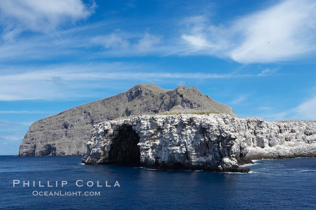 Wolf Island is the largest of the islands in the distant northern island group of the Galapagos archipelago, is home to hundreds of thousands of seabirds.  Vast schools of sharks and fish inhabit the waters surrounding Wolf Island. Galapagos Islands, Ecuador, natural history stock photograph, photo id 16632