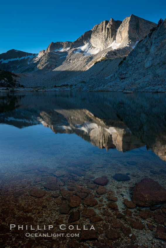 Cathedral Range peaks reflected in the still waters of Townsley Lake at sunrise. Yosemite National Park, California, USA, natural history stock photograph, photo id 25794