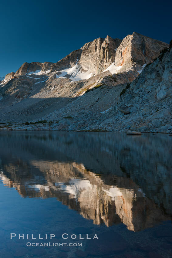 Cathedral Range peaks reflected in the still waters of Townsley Lake at sunrise. Yosemite National Park, California, USA, natural history stock photograph, photo id 25756