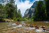The South Fork of the Kings River flows through Kings Canyon National Park, in the southeastern Sierra mountain range. Grand Sentinel, a huge granite monolith, is visible on the right above pine trees. Late summer. Sequoia Kings Canyon National Park, California, USA. Image #09855