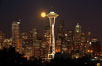 Full moon rises over Seattle city skyline, Space Needle at right. Washington, USA. Image #13666