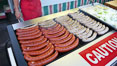 Sausages on the grill, hot dogs, bratwurst. Del Mar Fair, California, USA. Image #20862