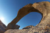 Mobius Arch in golden early morning light.  The natural stone arch is found in the scenic Alabama Hlls near Lone Pine, California. Alabama Hills Recreational Area, USA
