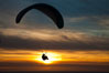 Paraglider soaring at Torrey Pines Gliderport, sunset, flying over the Pacific Ocean. La Jolla, California, USA. Image #24286