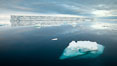 Floating ice and glassy water. Paulet Island, Antarctic Peninsula, Antarctica. Image #24889