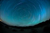 Star trails, rotating around the North Star (Polaris), seen from Death Valley. Milky Way Galaxy, The Universe. Image #25270