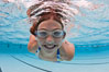 Young girl swimming in a pool. Image #25290