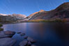 Star trails and alpenglow on the Sierra Nevada, Paiute Peak, before sunrise, reflected in North Lake in the Sierra Nevada. Bishop Creek Canyon Sierra Nevada Mountains, California, USA. Image #26053