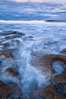 Waves wash over sandstone reef, clouds and sky. La Jolla, California, USA. Image #26335