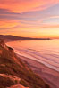 Sunset falls upon Torrey Pines State Reserve, viewed from the Torrey Pines glider port.  La Jolla, Scripps Institution of Oceanography and Scripps Pier are seen in the distance. California, USA. Image #26438