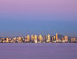 San Diego downtown city skyline and waterfront, sunset reflections and San Diego Bay. Earth-shadow (Belt of Venus) visible in the atmosphere. California, USA. Image #27102
