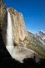 Yosemite Falls and rainbow, Half Dome in distance, viewed from the Yosemite Falls trail, spring. Yosemite National Park, California, USA. Image #27742