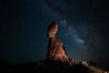 Balanced Rock and Milky Way stars at night. Arches National Park, Utah, USA