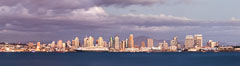 San Diego city skyline, dusk, clearing storm clouds. California, USA. Image #28008