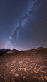 The Milky Way at Night over Sky Rock.  Sky Rock petroglyphs near Bishop, California. Hidden atop an enormous boulder in the Volcanic Tablelands lies Sky Rock, a set of petroglyphs that face the sky. These superb examples of native American petroglyph artwork are thought to be Paiute in origin, but little is known about them. USA. Image #28807