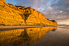 Torrey Pines cliffs and storm clouds at sunset. Torrey Pines State Reserve, San Diego, California, USA. Image #29102