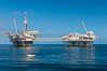Oil platforms Ellen (left) and Elly (right) lie in 260' of seawater 8.5 miles off Long Beach, California. USA. Image #31095