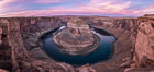 Spectacular Horseshoe Bend sunrise. The Colorado River makes a 180-degree turn at Horseshoe Bend. Here the river has eroded the Navajo sandstone for eons, digging a canyon 1100-feet deep. Page, Arizona, USA. Image #35940