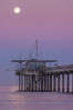 Full Moon Setting Over SIO Pier in the moments just before sunrise, Scripps Institution of Oceanography. La Jolla, California, USA. Image #37506