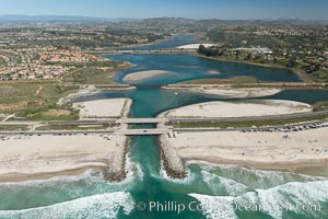 Aerial photo of Batiquitos Lagoon, Carlsbad. The Batiquitos Lagoon is a coastal wetland in southern Carlsbad, California. Part of the lagoon is designated as the Batiquitos Lagoon State Marine Conservation Area, run by the California Department of Fish and Game as a nature reserve