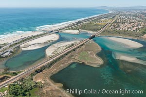 Aerial photo of Batiquitos Lagoon, Carlsbad. The Batiquitos Lagoon is a coastal wetland in southern Carlsbad, California. Part of the lagoon is designated as the Batiquitos Lagoon State Marine Conservation Area, run by the California Department of Fish and Game as a nature reserve