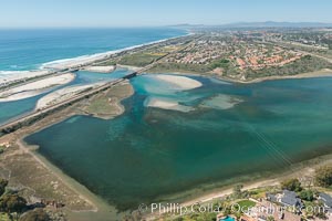 Aerial photo of Batiquitos Lagoon, Carlsbad. The Batiquitos Lagoon is a coastal wetland in southern Carlsbad, California. Part of the lagoon is designated as the Batiquitos Lagoon State Marine Conservation Area, run by the California Department of Fish and Game as a nature reserve. Callifornia, USA, natural history stock photograph, photo id 30559