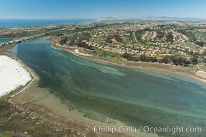 Aerial photo of Batiquitos Lagoon, Carlsbad. The Batiquitos Lagoon is a coastal wetland in southern Carlsbad, California. Part of the lagoon is designated as the Batiquitos Lagoon State Marine Conservation Area, run by the California Department of Fish and Game as a nature reserve