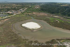 Aerial photo of Batiquitos Lagoon, Carlsbad. The Batiquitos Lagoon is a coastal wetland in southern Carlsbad, California. Part of the lagoon is designated as the Batiquitos Lagoon State Marine Conservation Area, run by the California Department of Fish and Game as a nature reserve