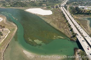 Aerial photo of Batiquitos Lagoon, Carlsbad. The Batiquitos Lagoon is a coastal wetland in southern Carlsbad, California. Part of the lagoon is designated as the Batiquitos Lagoon State Marine Conservation Area, run by the California Department of Fish and Game as a nature reserve