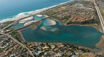 Aerial photo of Batiquitos Lagoon, Carlsbad. The Batiquitos Lagoon is a coastal wetland in southern Carlsbad, California. Part of the lagoon is designated as the Batiquitos Lagoon State Marine Conservation Area, run by the California Department of Fish and Game as a nature reserve