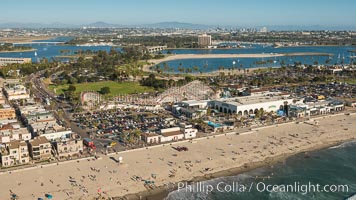 Aerial photo of Belmont Park, the Giant Dipper roller coaster, Mission Bay and San Diego in the distance