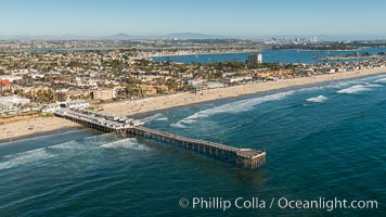 Aerial Photo of Crystal Pier, Pacific Beach. Crystal Pier, 872 feet long and built in 1925, extends out into the Pacific Ocean from the town of Pacific Beach