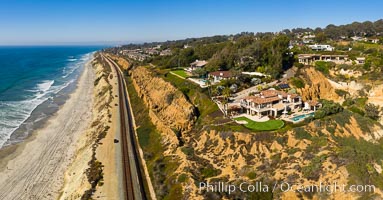 Aerial Photo of Del Mar Coastline, North County, San Diego, including train tracks running along the edge of the sea cliffs above the Pacific Ocean