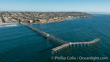 Aerial Photo of Ocean Beach Pier. Ocean Beach Pier, also known as the OB Pier or Ocean Beach Municipal Pier, is the longest concrete pier on the West Coast measuring 1971 feet (601 m) long. Sunset Cliffs and Point Loma extend off to the south