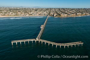 Aerial Photo of Ocean Beach Pier. Ocean Beach Pier, also known as the OB Pier or Ocean Beach Municipal Pier, is the longest concrete pier on the West Coast measuring 1971 feet (601 m) long