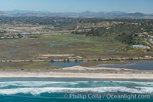 Aerial Photo of San Elijo Lagoon and Cardiff Reef beach. San Elijo Lagoon Ecological Reserve is one of the largest remaining coastal wetlands in San Diego County, California, on the border of Encinitas, Solana Beach and Rancho Santa Fe