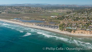 Aerial Photo of San Elijo Lagoon and Cardiff Reef beach. San Elijo Lagoon Ecological Reserve is one of the largest remaining coastal wetlands in San Diego County, California, on the border of Encinitas, Solana Beach and Rancho Santa Fe