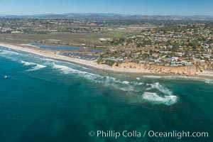 Aerial Photo of San Elijo Lagoon and Cardiff Reef beach. San Elijo Lagoon Ecological Reserve is one of the largest remaining coastal wetlands in San Diego County, California, on the border of Encinitas, Solana Beach and Rancho Santa Fe