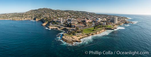 Aerial Panoramic Photo of Point La Jolla and La Jolla Cove, Boomer Beach, Scripps Park. Panoramic aerial photograph of La Jolla Cove and Scripps Parks (center), with La Jollaâ€™s Mount Soledad rising above, La Jolla Shores and La Jolla Caves to the left and the La Jolla Coast with Childrenâ€™s Pool (Casa Cove) to the right. The undersea reefs of Boomer Beach are seen through the clear, calm ocean waters. This extremely high resolution panorama will print 50â€³ high by 130â€³ long with no interpolation