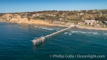 Aerial Photo of Scripps Pier. SIO Pier. The Scripps Institution of Oceanography research pier is 1090 feet long and was built of reinforced concrete in 1988, replacing the original wooden pier built in 1915. The Scripps Pier is home to a variety of sensing equipment above and below water that collects various oceanographic data. The Scripps research diving facility is located at the foot of the pier. Fresh seawater is pumped from the pier to the many tanks and facilities of SIO, including the Birch Aquarium. The Scripps Pier is named in honor of Ellen Browning Scripps, the most significant donor and benefactor of the Institution